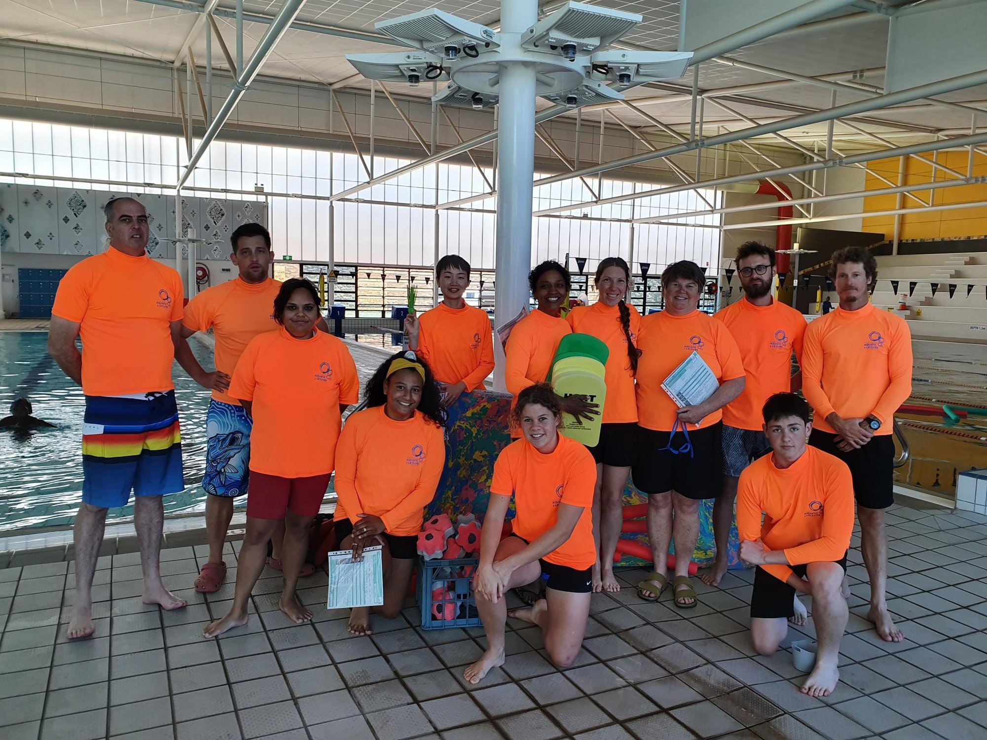 AUSTSWIM trainers and assessors gathered at an indoor aquatic centre supporting national swim teacher training
