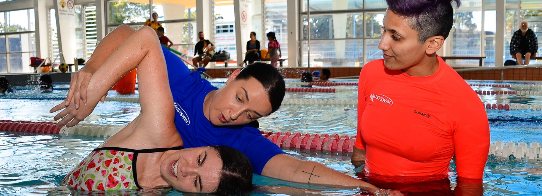 Children practising underwater swimming and water safety skills in a supervised learn to swim program