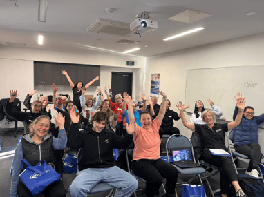 Presenters in Pools class posing for a photo inside classroom