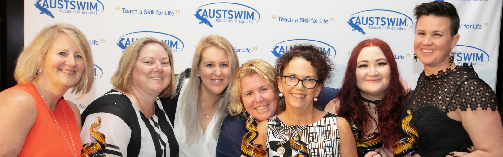 AUSTSWIM Awards Hero Image with award recipients from 2019